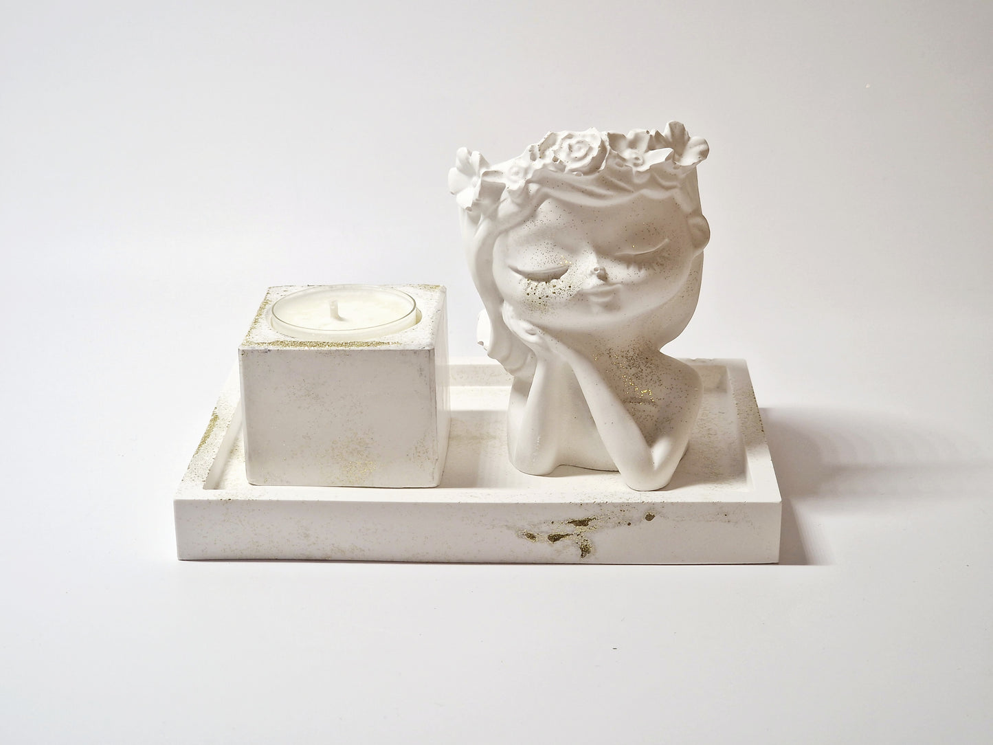 Gipsfigur mit Duftkerze